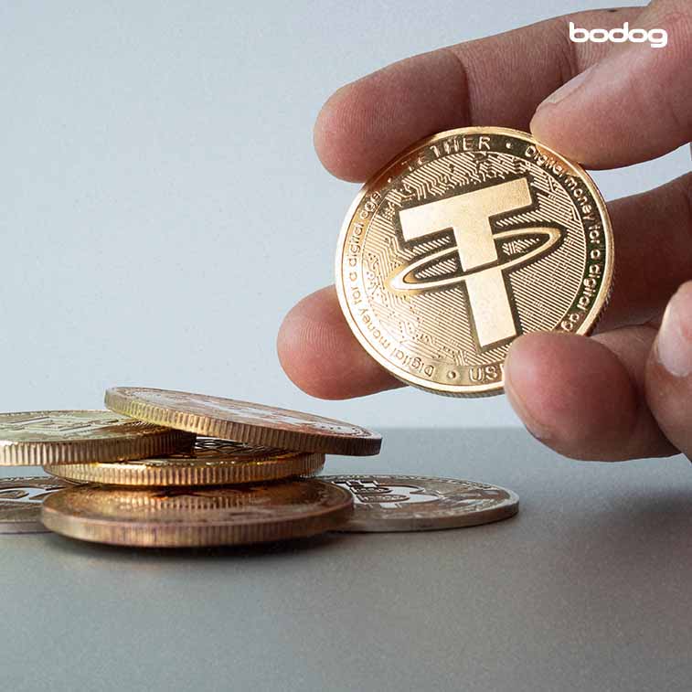 monedas tether mano